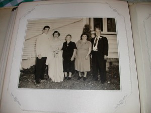 A photo from Fred & Josephine's wedding album, showing the couple with three relatives -- Rose Lombardo, Antonette Ross, and Fred Ross, Sr. (left to right), 1950